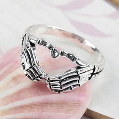 Hand Clasping Ring