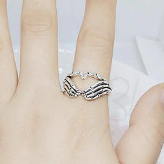 Hand Clasping Ring